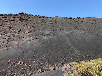 Scenic view of desert against clear sky