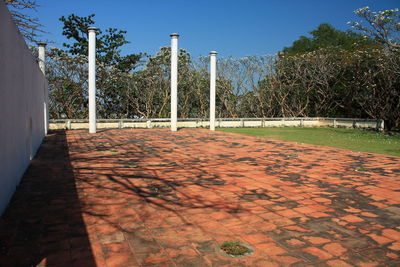 View of park against clear blue sky