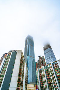 Low angle view of modern buildings against sky