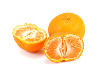 Close-up of orange against white background