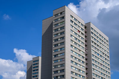 Low angle view of modern buildings against sky