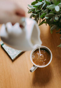 Close-up of coffee cup on table