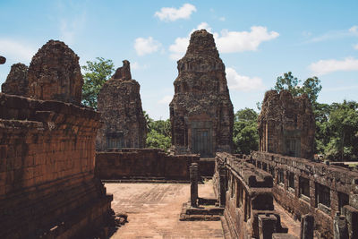 Low angle view of old temple sky