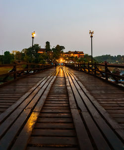 Illuminated bridge dawn sky