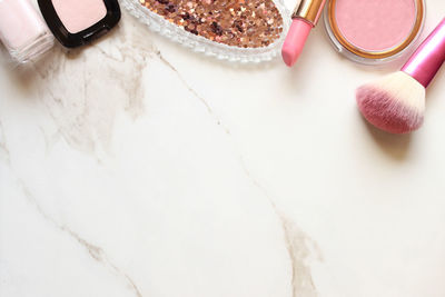 High angle view of beauty products on table