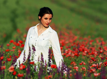 Woman standing on field