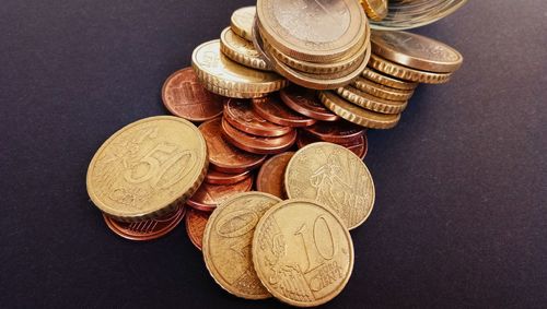 High angle view of coins