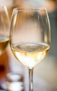 Close-up of wineglass on table