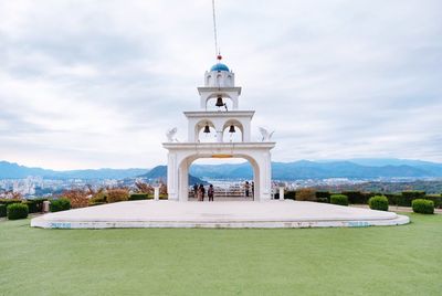 View of historic building against cloudy sky