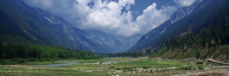 Panoramic view of landscape and mountains against sky