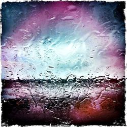 Close-up of water drops on glass