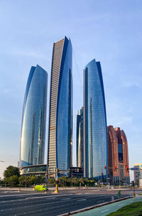 Modern buildings in city against sky