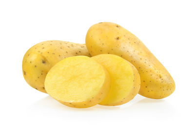 Close-up of oranges against white background