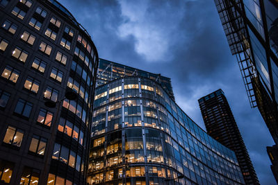 Low angle view of modern buildings against sky