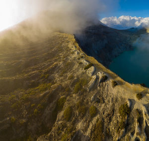 Smoke emitting from volcanic mountain