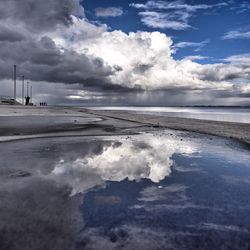 View of sea against cloudy sky