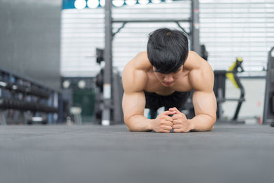 Man exercising in gym