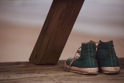 Close-up of shoes on table