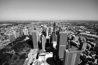 High angle view of modern buildings in city against sky