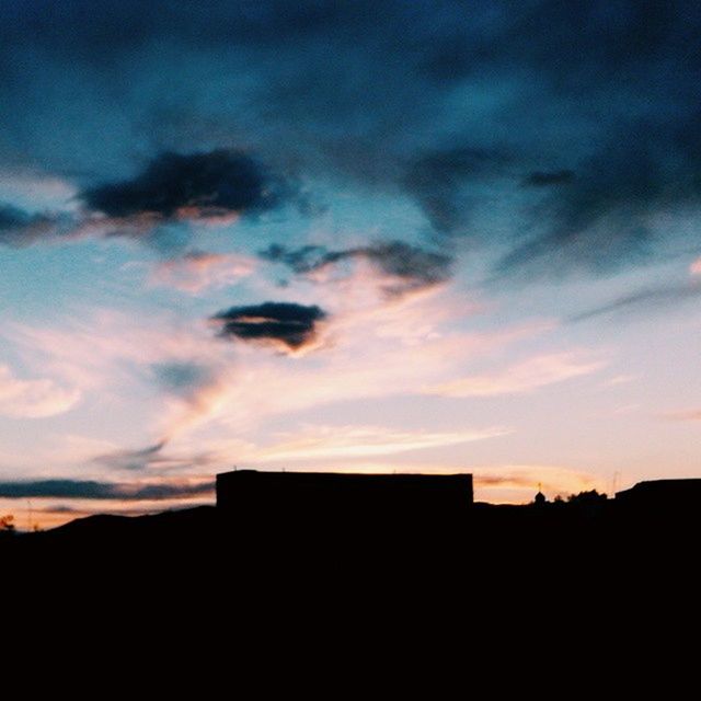 sunset, silhouette, sky, building exterior, built structure, architecture, cloud - sky, scenics, beauty in nature, house, cloud, orange color, dramatic sky, cloudy, dark, tranquil scene, nature, tranquility, residential structure, dusk