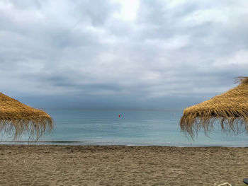 Scenic view of beach against sky