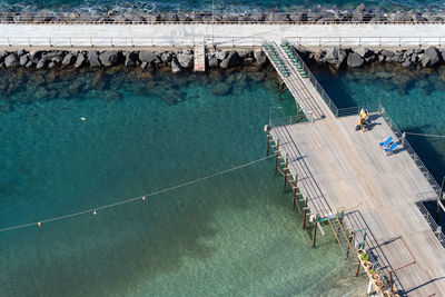 High angle view of construction site by swimming pool