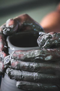 Close-up of hand holding ice cream