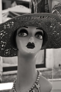 Close-up of hat on female mannequin at store