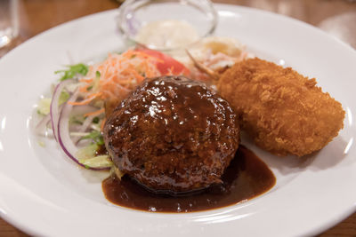 Close-up of served food in plate