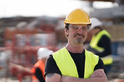 Close-up of man working at construction site