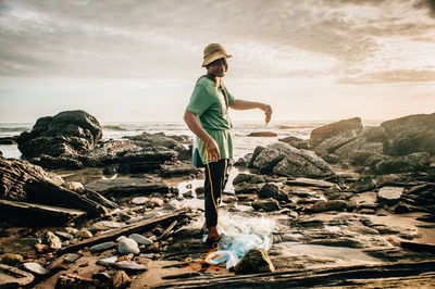 Man standing on rock formation