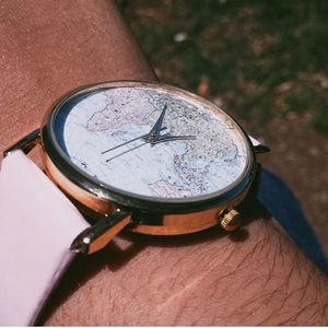 High angle view of clock on table