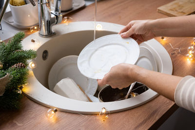 High angle view of person preparing food on table