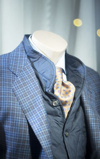 Close-up of suit displayed mannequins