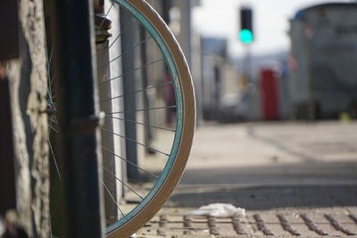 Close-up of bicycle on street
