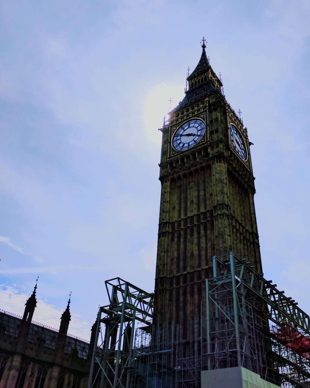 LOW ANGLE VIEW OF TOWER AGAINST CLOUDY SKY