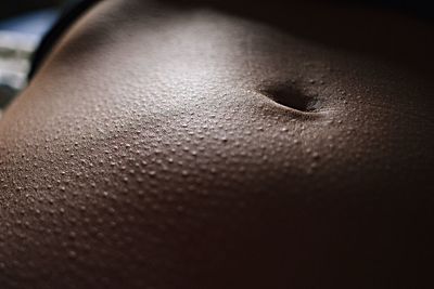 Close-up of human abdomen