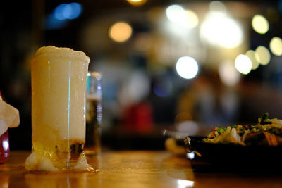 Close-up of wine glass on table at restaurant