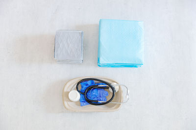 High angle view of medical equipment on white background