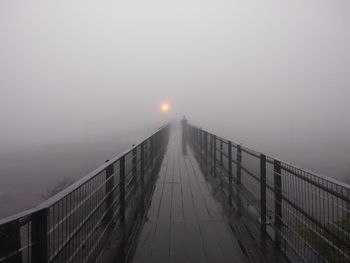 Bridge against sky at dusk