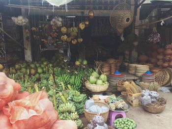 Man for sale at market stall