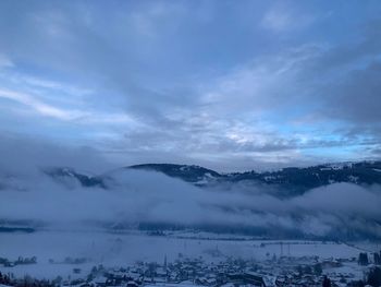 Scenic view of snowcapped mountains against sky