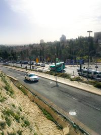 High angle view of cars on road against sky