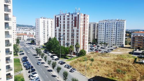 High angle view of street amidst buildings in city