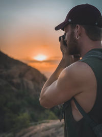 Side view of young man looking away