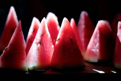Close-up of chopped fruits against black background