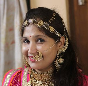 Close-up portrait of young woman with eyes closed