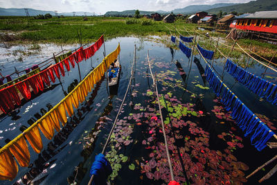 High angle view of multi colored boats moored in lake