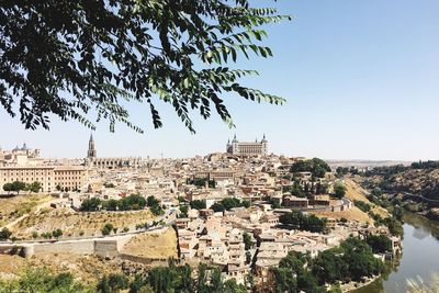 View of cityscape against clear sky