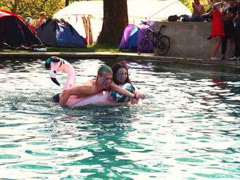 Portrait of people in swimming pool